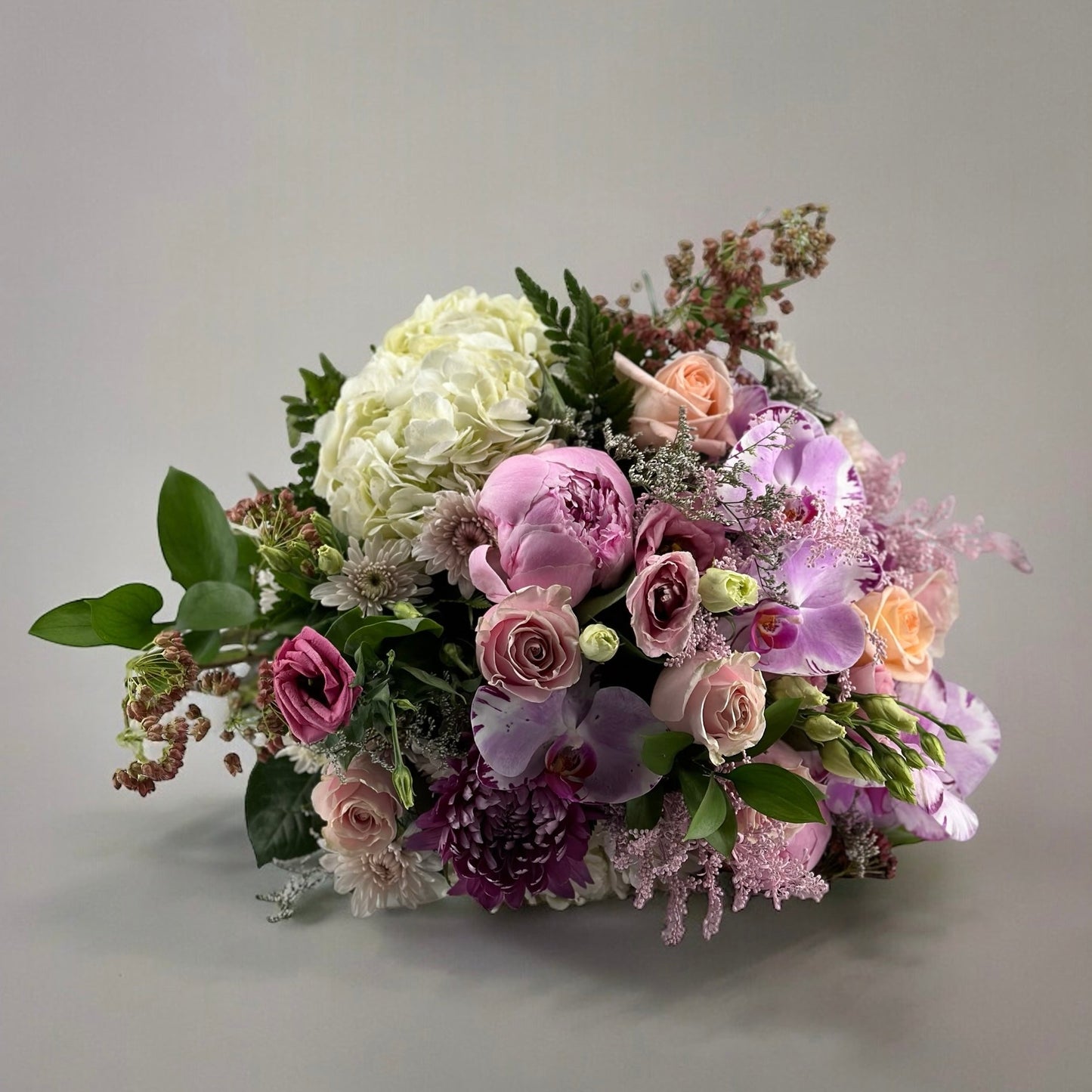 Pastel Garden Bouquet with pink roses and peonies by best florist in Toronto, luxury bouquet, same day delivery available.