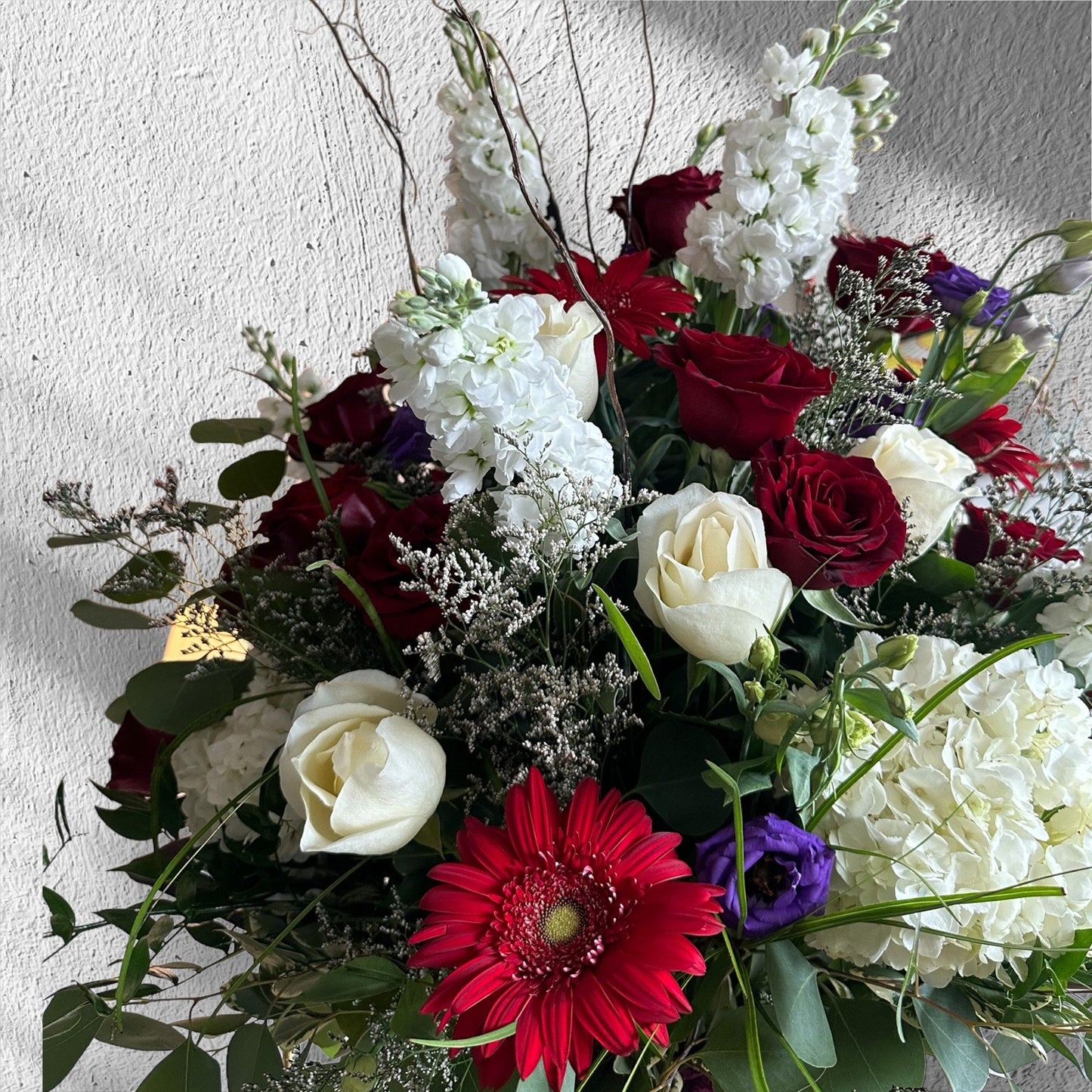 Majestic Elegance Vase with red roses, white flowers, and greenery, perfect for luxury floral arrangements in Toronto.