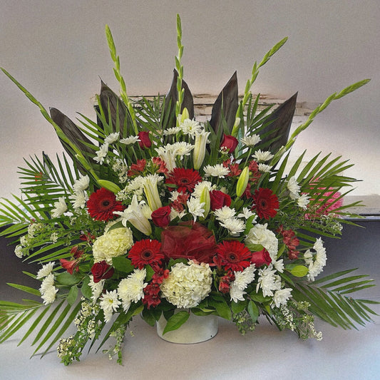 "Majestic Harmony" luxury floral funeral arrangement with red, white flowers & lush greens; best sympathy bouquet in Toronto, GTA.