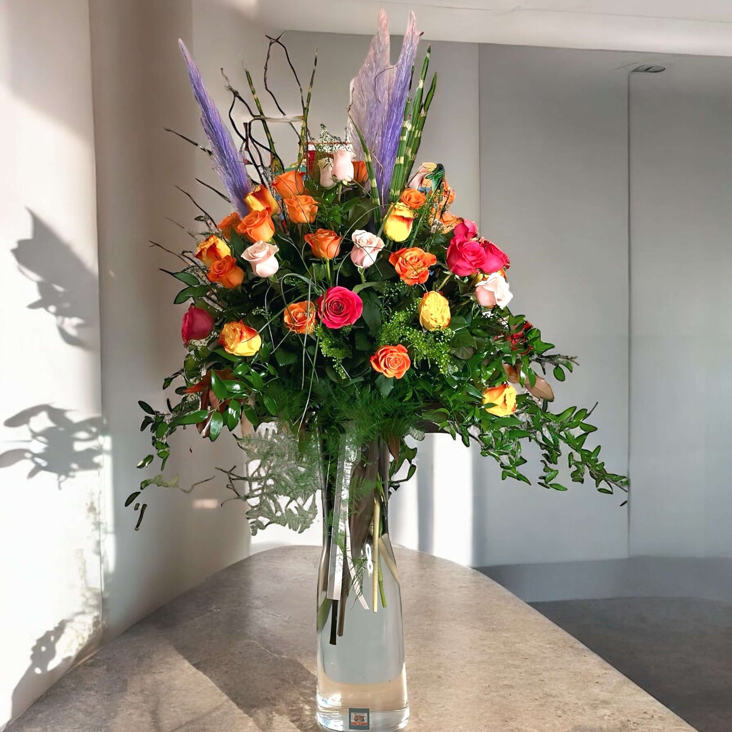 Handcrafted mix rose bouquet and eucalyptus, symbolizing eternal love and admiration.