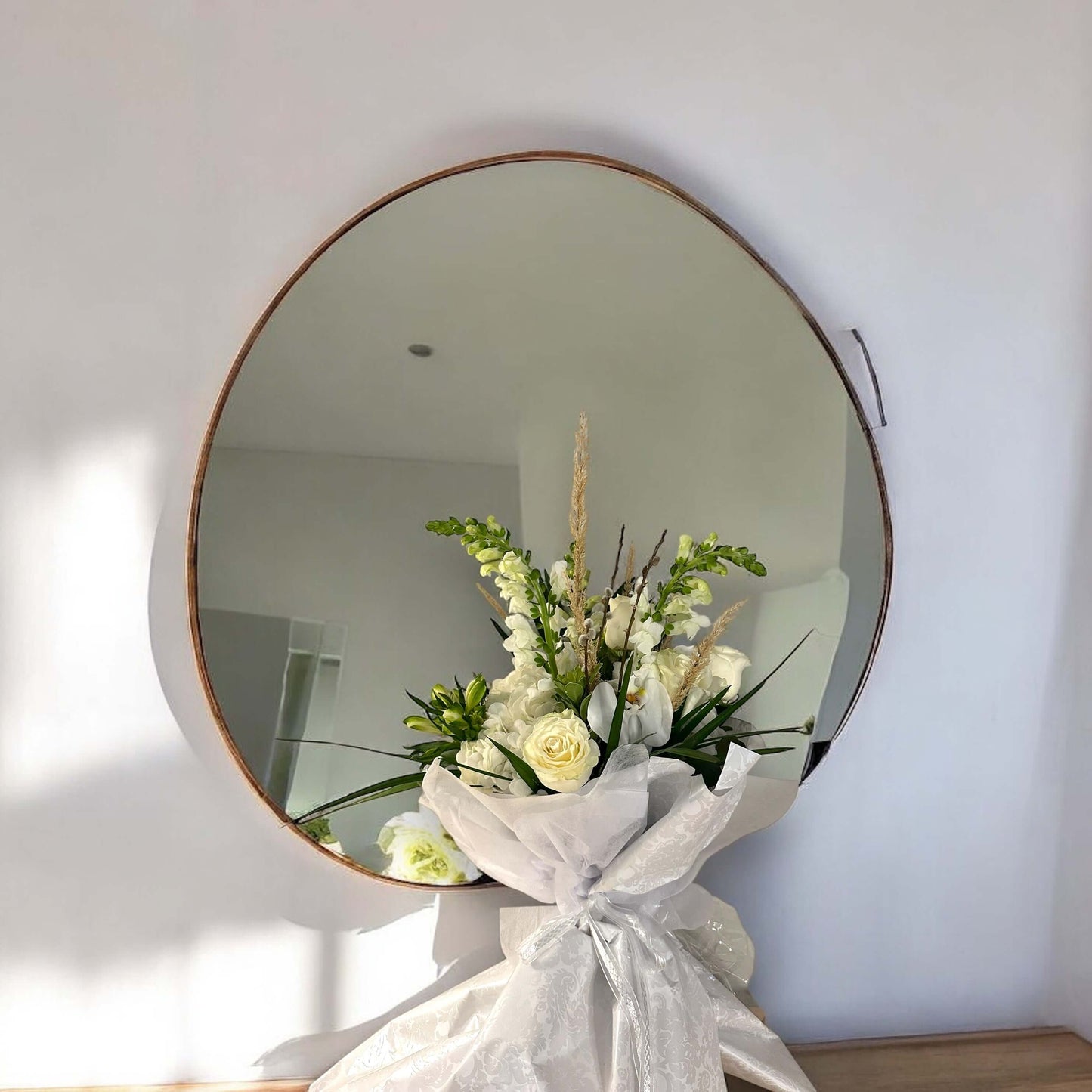 Romantic bridal bouquet with blush pink and white roses, perfect for weddings and special ceremonies.
